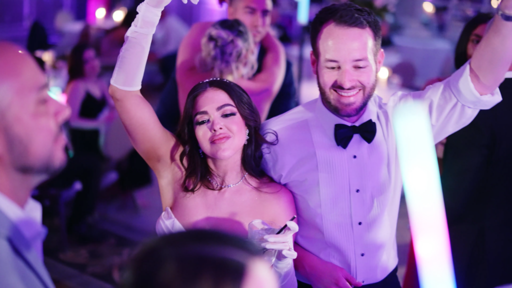 New husband and wife dance at their wedding reception in Dallas, TX.