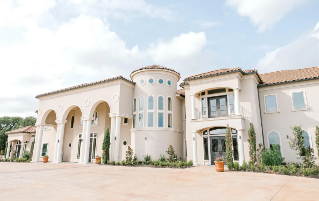 D’Vine Grace Vineyard exterior with Tuscan-style architecture and vineyard views in McKinney Texas