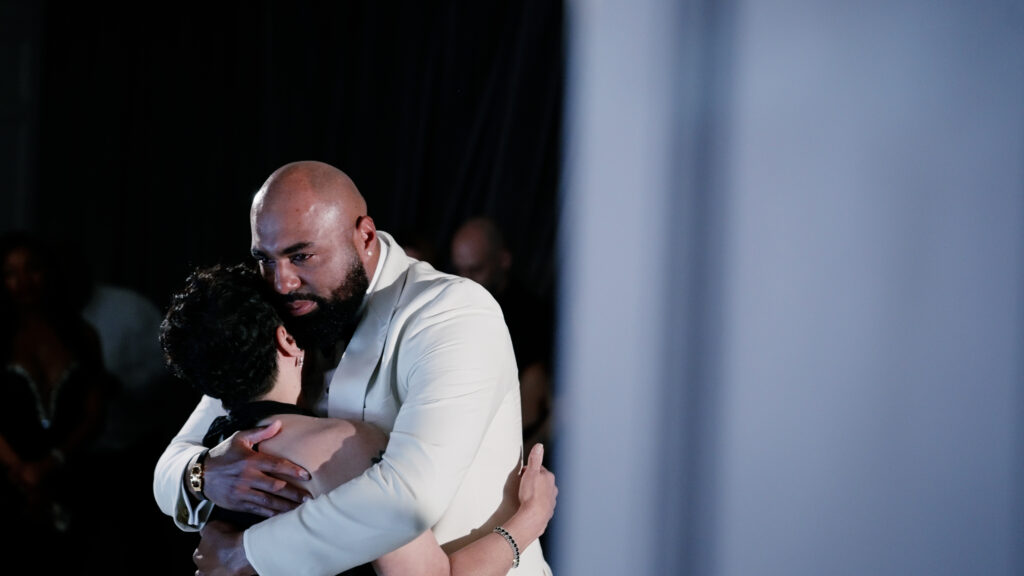 Groom embraces bride in their final dance of the evening at their reception in Boston, MA.