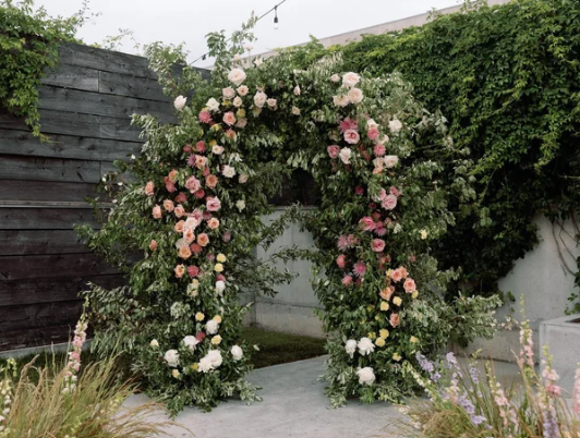 A floral wedding arch set up by Jove Meyer in Boston, MA.