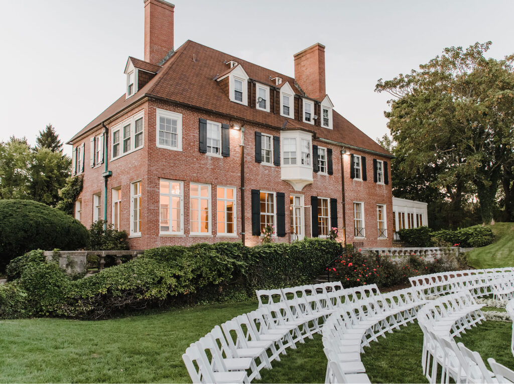 Misselwood Events in Beverly Massachusetts showing brick estate building with outdoor wedding ceremony setup and coastal surroundings on the North Shore near Boston.