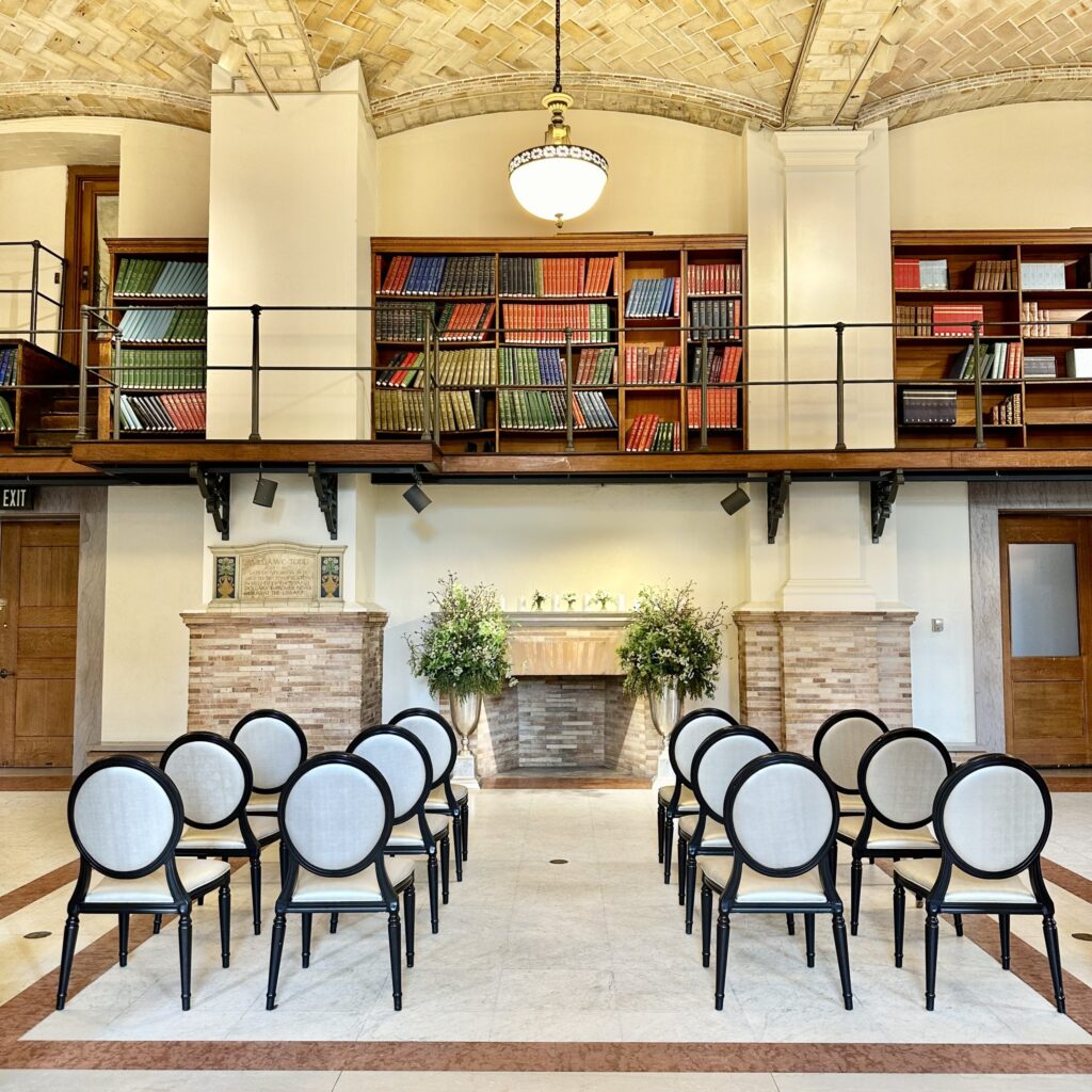 Romantic wedding at Boston Public Library featuring grand interiors and classic architectural details.