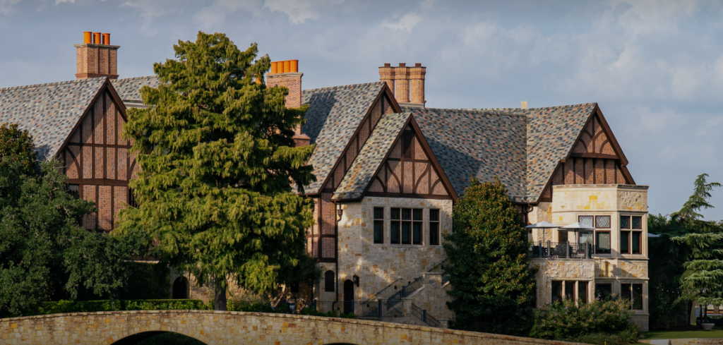 Exterior view of Dallas Country Club in Dallas, Texas, featuring its classic architecture, manicured grounds, and elegant entrance reflecting a timeless private club setting.