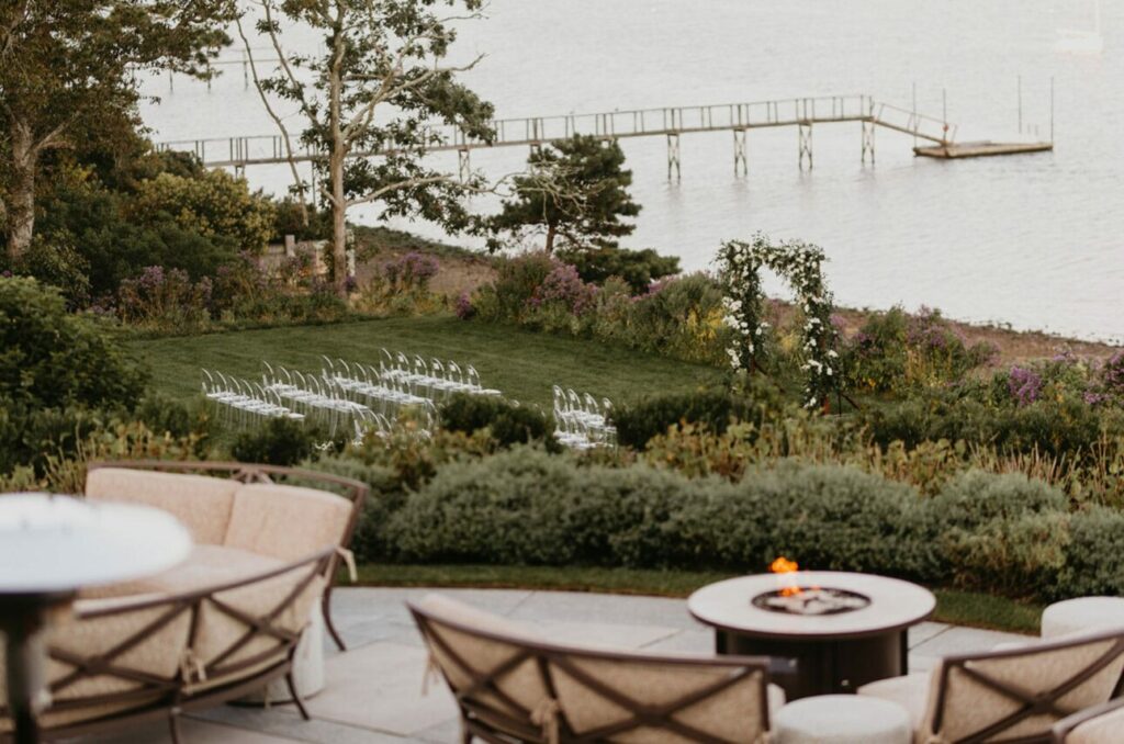 Outdoor wedding setup at Wequassett Resort in Cape Cod with waterfront views and elegant décor.